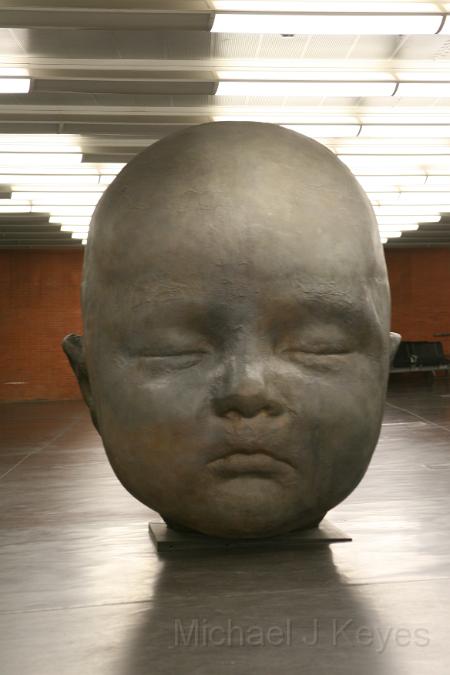 IMG_8046.JPG - Giant Baby Head in the Madrid Train Station