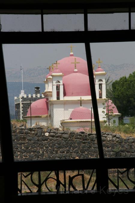 IMG_7383.JPG - Greek Church, viewed through the widow of the Memorial at Capernaum