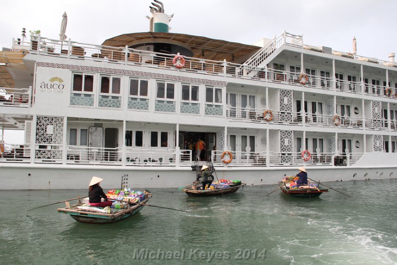 IMG_8089.JPG - As we cruise away from the ship, the women waited for our return after our visit to the cave.