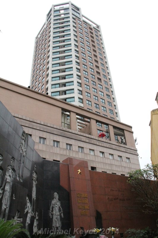 IMG_7605.JPG - View of modern skyscraper from Hao Lo Prison yard