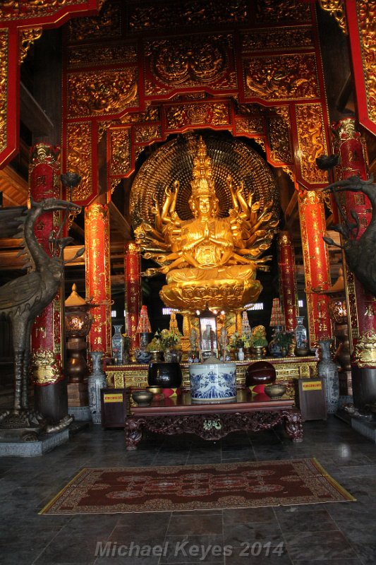 IMG_9231.JPG - he two higher temple buildings  contained large golden Buddhas.Guan Yin statue  