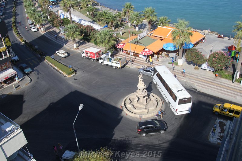 IMG_5686.JPG - This poor bus was stuck fror about 5-10 minutes till that silver car was moved.    This was the veiw from our hotel in Kusudasi!