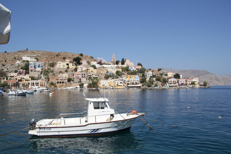 IMG_0084.JPG - Symi Harbor, and our first desination , the Church Tower in the distance. 